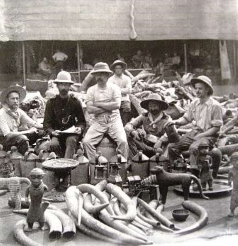 Members of the British Punitive Expedition which invaded Benin in 1897 posing proudly with the Benin artefacts they looted.